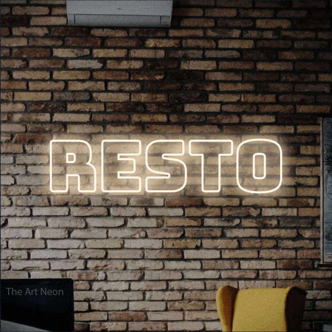 “Resto” LED neon sign in warm white, with bold outline lettering, shown against warm-toned brickwork.