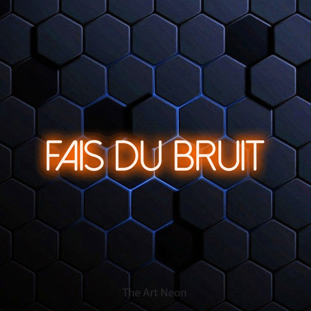 “Fais du bruit” LED neon sign in orange, with thin sans-serif lettering, shown against a dark blue honeycomb pattern.