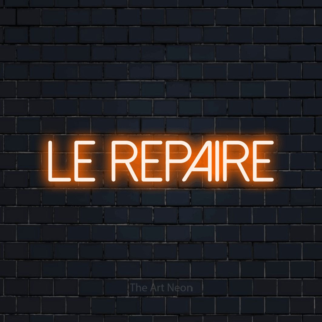 “Le repaire” LED neon sign in orange, with thin sans-serif lettering, shown against a dark navy brick wall.