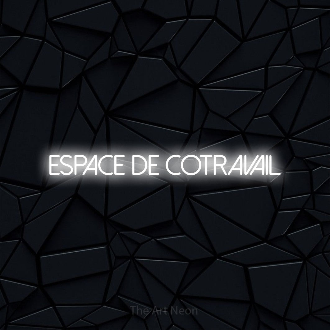 “Espace de cotravail” LED neon sign in cool white, with thin sans-serif lettering, shown against a black polygonal surface.