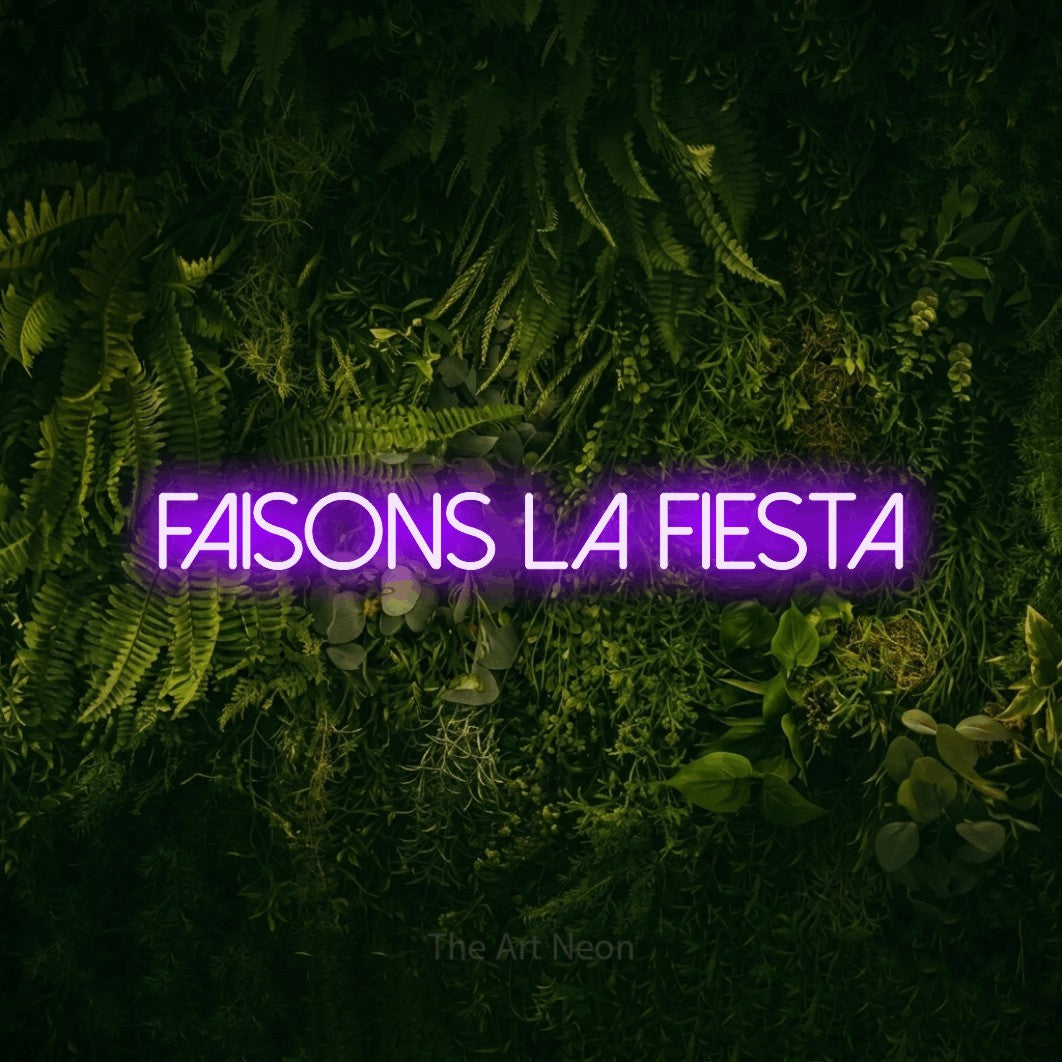 “Faisons la fiesta” LED neon sign in purple, with thin sans-serif lettering, shown against a dark moss and forest backdrop.