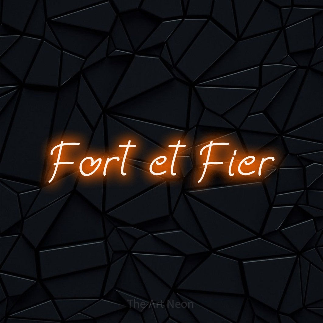 “Fort et fier” LED neon sign in orange, with slanted handwritten lettering, shown against a black polygonal surface.