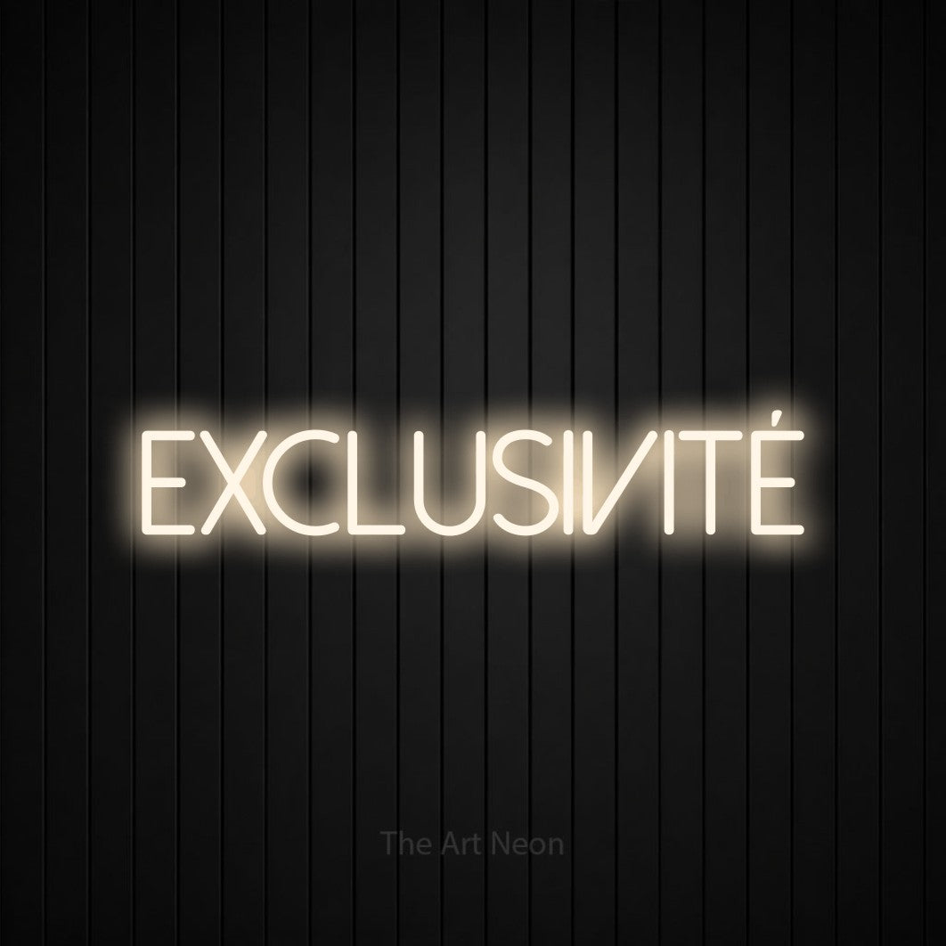 “Exclusivité” LED neon sign in warm white, with thin sans-serif lettering, shown against black vertical wall slats.