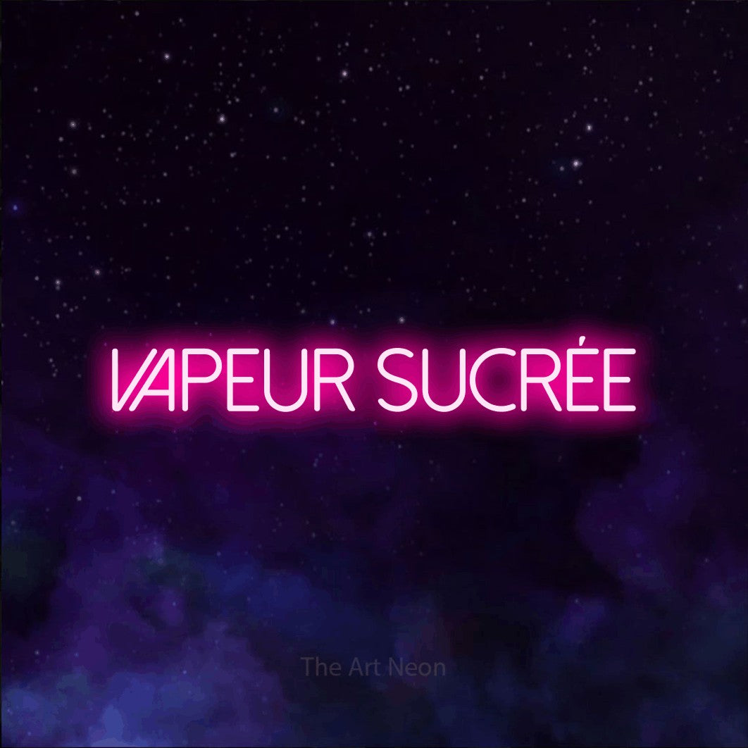“Vapeur sucrée” LED neon sign in hot pink, with thin sans-serif lettering, shown against a purple galaxy backdrop.