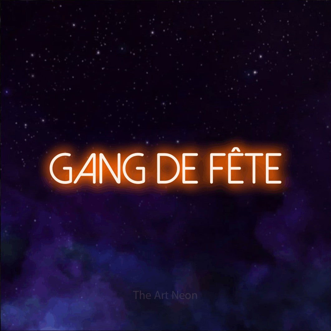 “Gang de fête” LED neon sign in orange, with thin sans-serif lettering, shown against a purple galaxy backdrop.