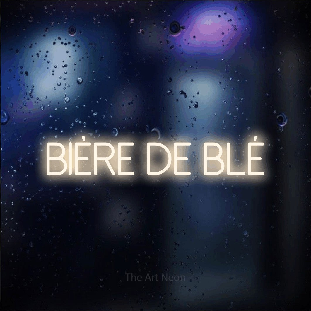 “Bière de blé” LED neon sign in warm white, with thin sans-serif lettering, shown against glass with blue and purple reflections.