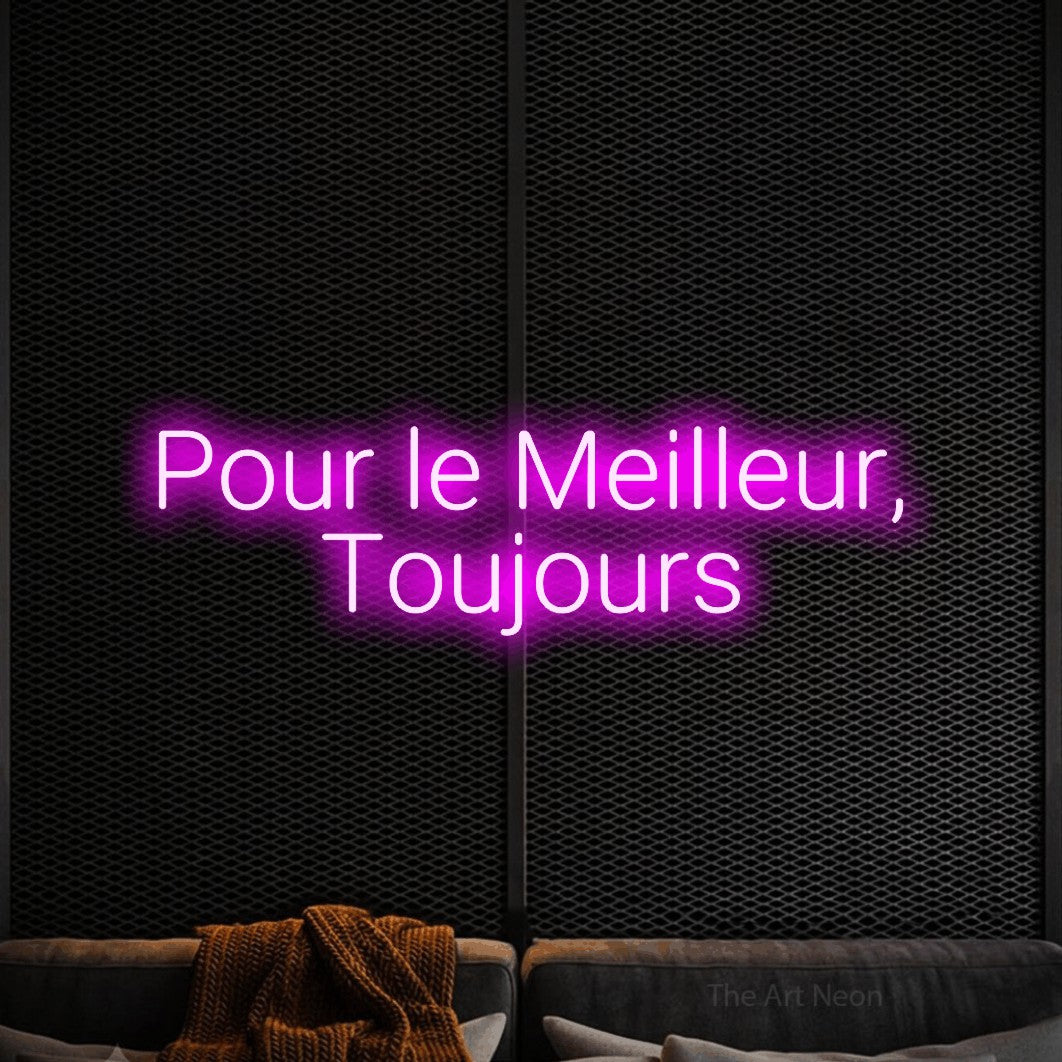 “Pour le meilleur, toujours” LED neon sign in pink, with rounded sans-serif lettering across 2 lines, shown against a modern dark-toned seating area.