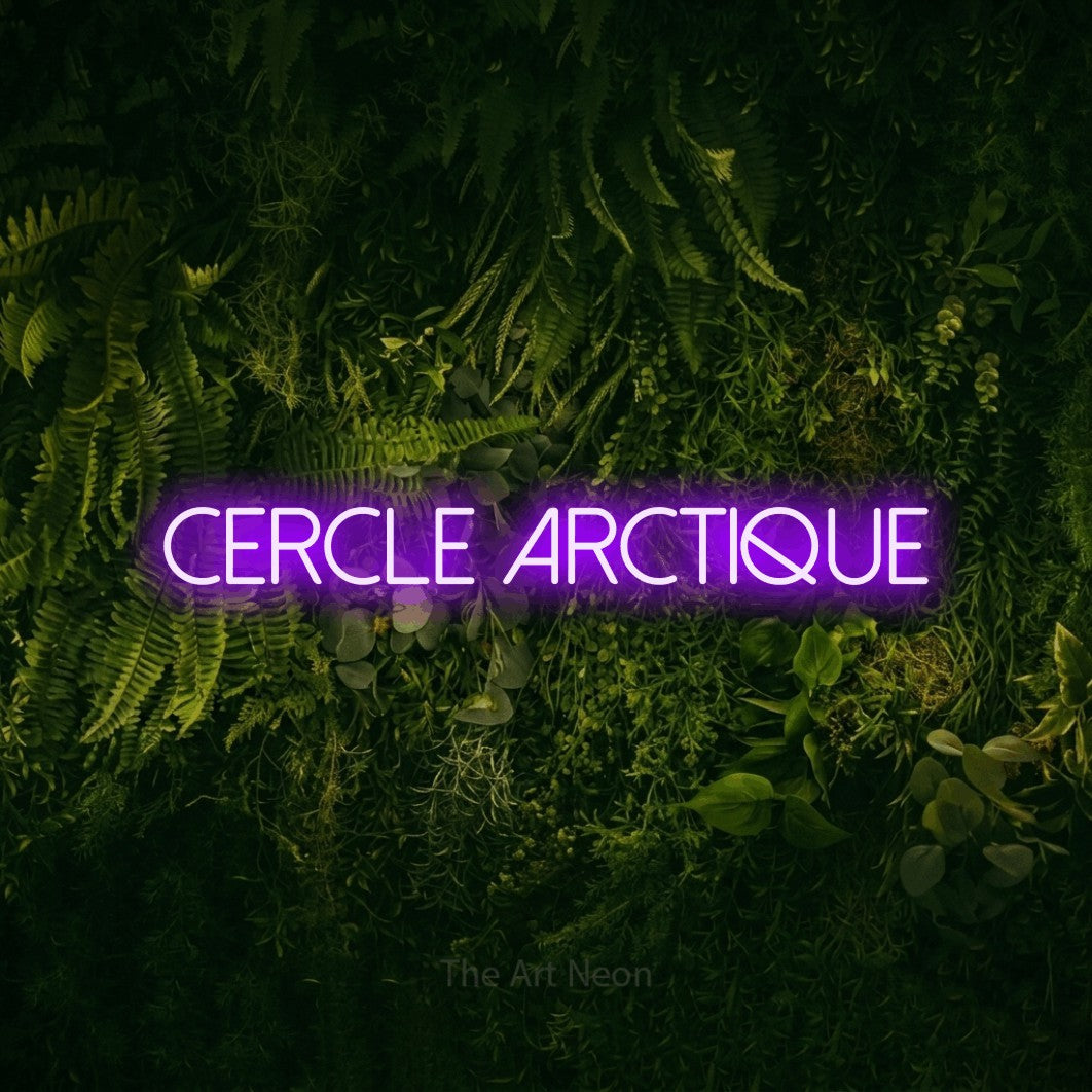 “Cercle arctique” LED neon sign in purple, with thin sans-serif lettering, shown against a dark moss and forest backdrop.