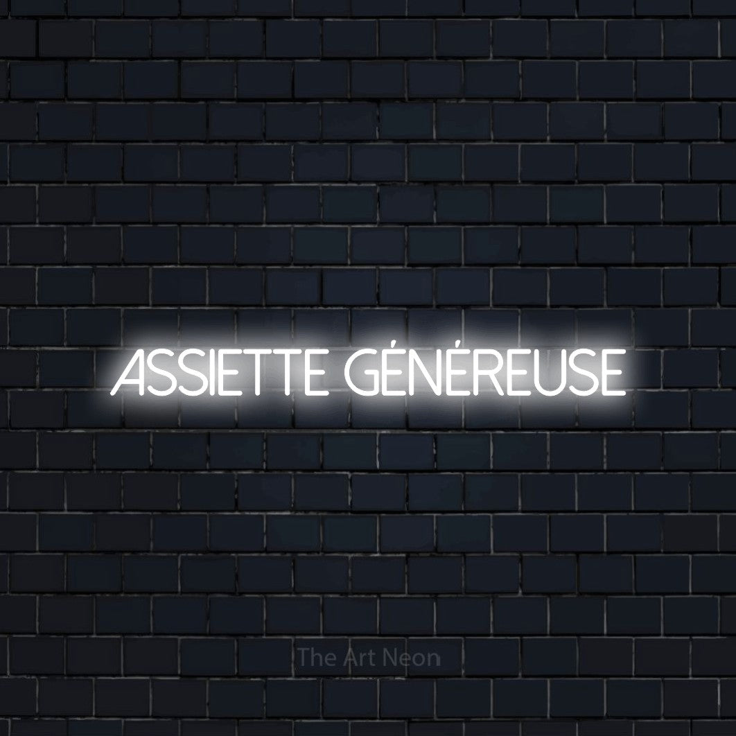 “Assiette généreuse” LED neon sign in cool white, with thin sans-serif lettering, shown against a dark navy brick wall.