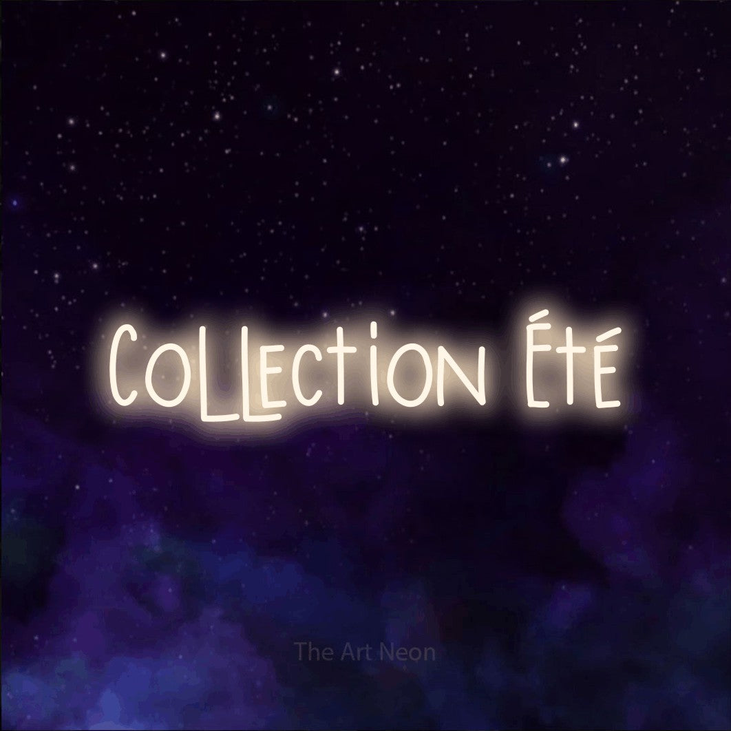 “Collection été” LED neon sign in warm white, with narrow hand-drawn lettering, shown against a purple galaxy backdrop.
