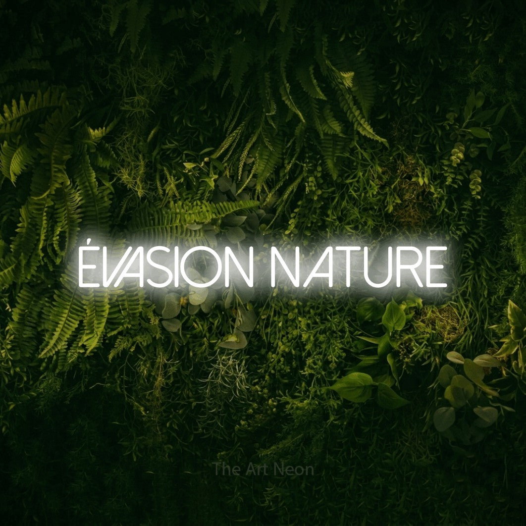 “Évasion nature” LED neon sign in cool white, with thin sans-serif lettering, shown against a dark moss and forest backdrop.