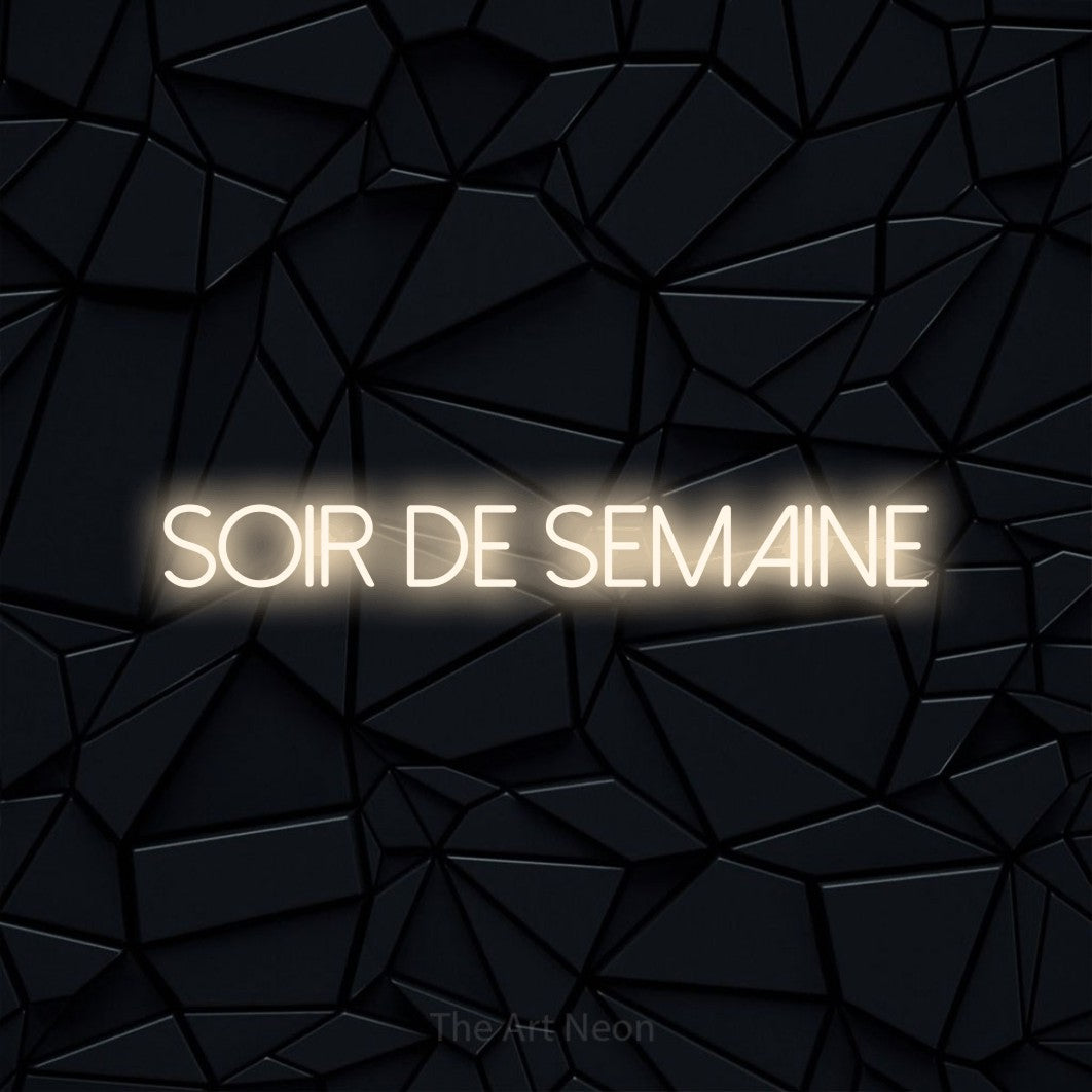 “Soir de semaine” LED neon sign in warm white, with thin sans-serif lettering, shown against a black polygonal surface.