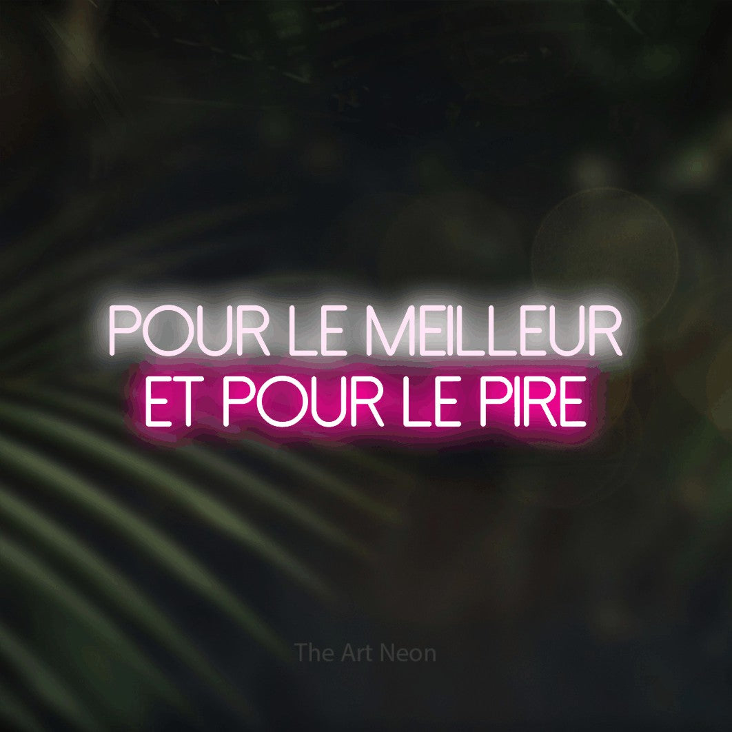 “Pour le meilleur et pour le pire” LED neon sign in cool white on the upper line and hot pink on the lower line, with thin sans-serif lettering across 2 lines, shown against a blurred palm and bokeh-light backdrop.