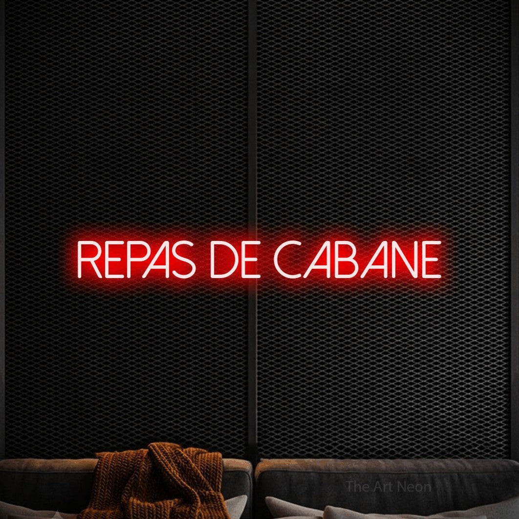 “Repas de cabane” LED neon sign in red, with thin sans-serif lettering, shown against a modern dark-toned seating area.