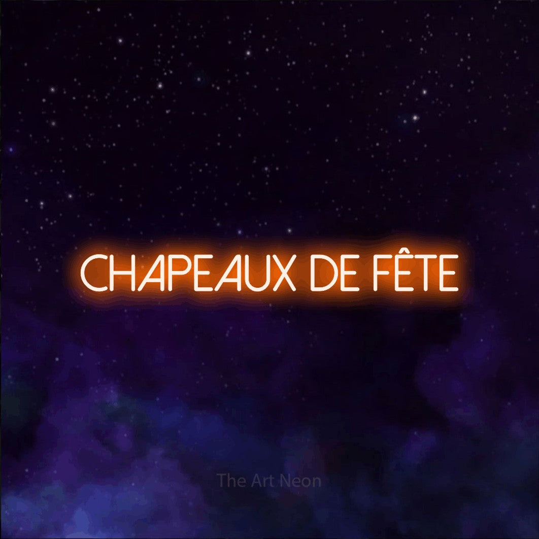 Composition en néon LED « Chapeaux de fête » en orange, en lettres fines sans empattement, mise en valeur sur une texture de galaxie violette, pour une fête.