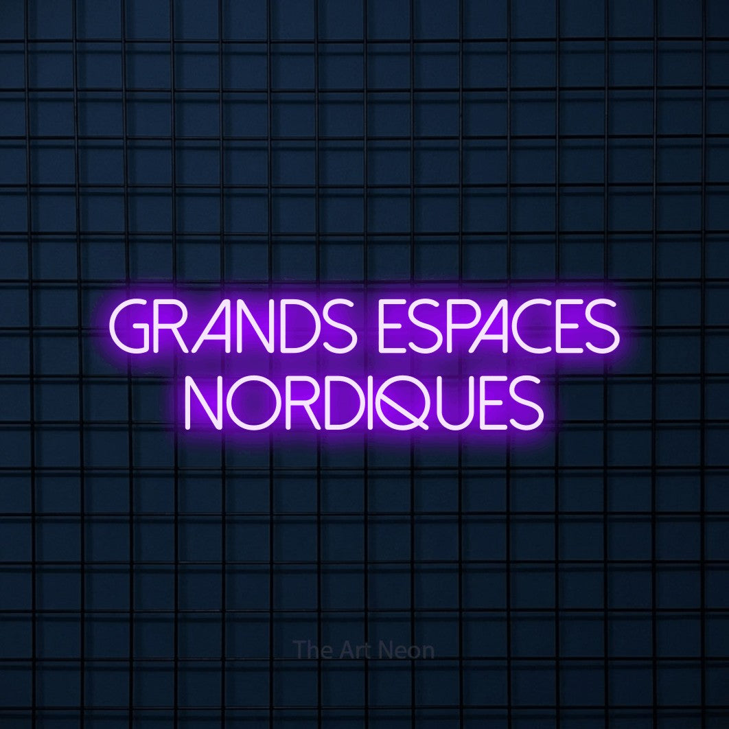 “Grands espaces nordiques” LED neon sign in purple, with thin sans-serif lettering across 2 lines, shown against a dark blue grid.