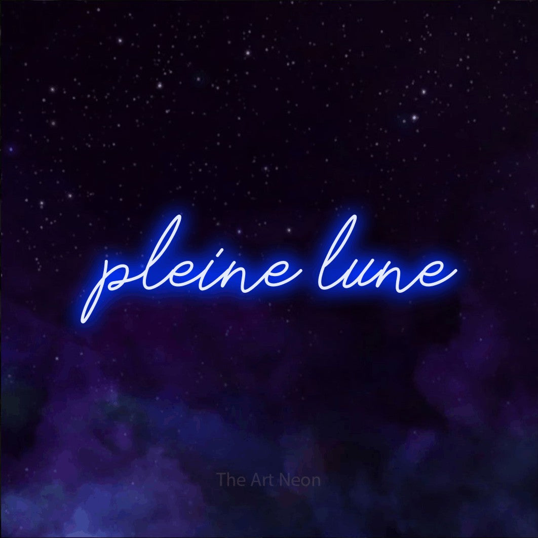 “Pleine lune” LED neon sign in blue, with cursive lettering, shown against a purple galaxy backdrop.