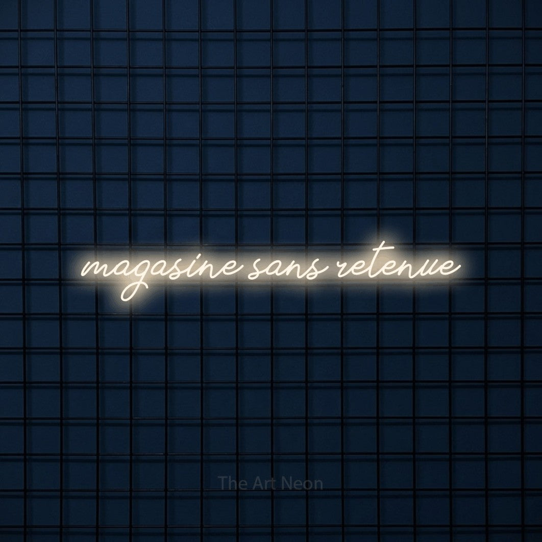 “Magasine sans retenue” LED neon sign in warm white, with cursive lettering, shown against a dark blue grid.