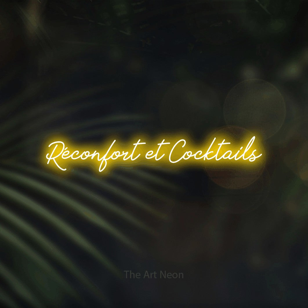 “Réconfort et cocktails” LED neon sign in yellow, with cursive lettering, shown against a blurred palm and bokeh-light backdrop.
