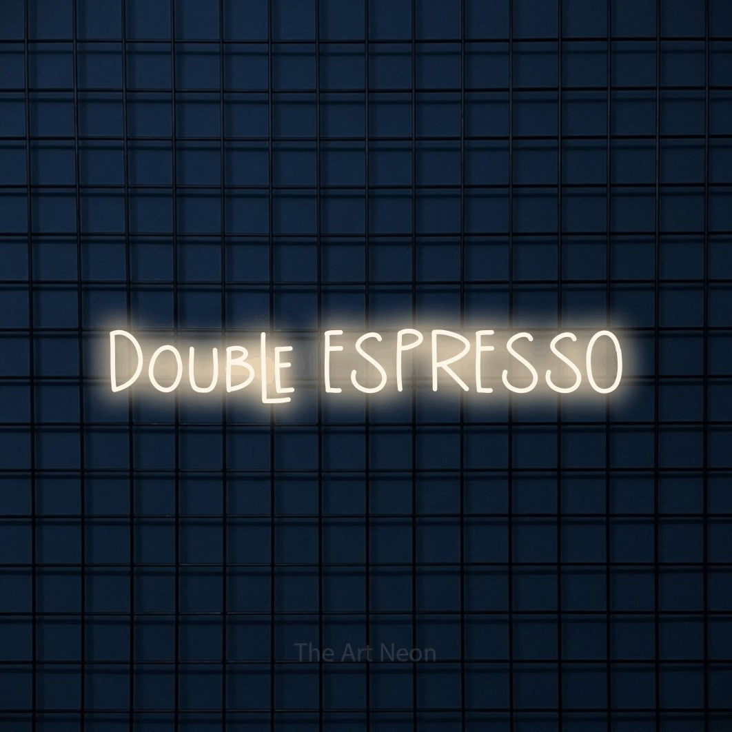 “Double espresso” LED neon sign in warm white, with narrow hand-drawn lettering, shown against a dark blue grid.