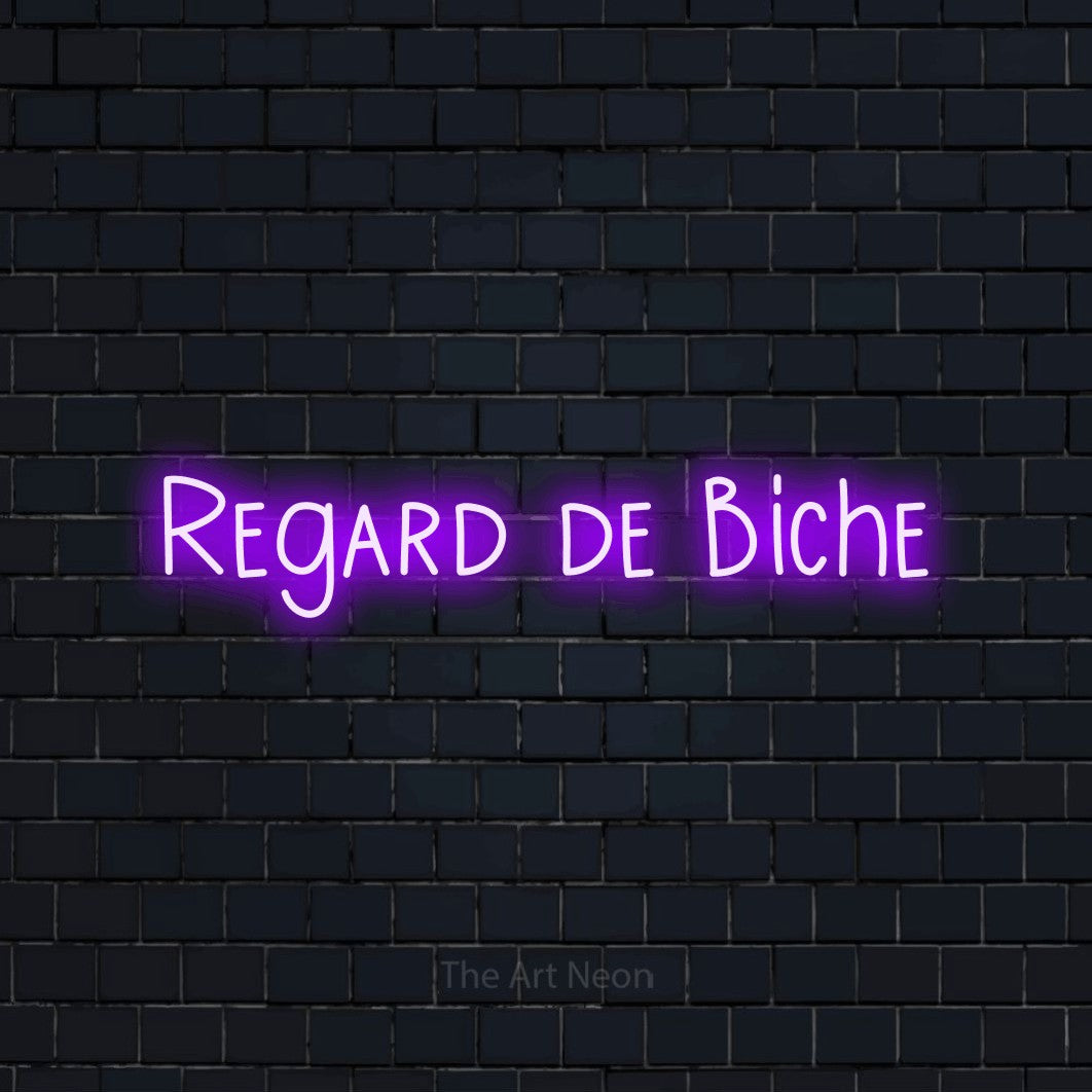 “Regard de biche” LED neon sign in purple, with narrow hand-drawn lettering, shown against a dark navy brick wall.