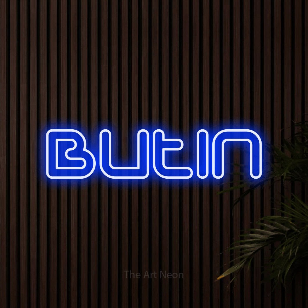 “Butin” LED neon sign in blue, with futuristic double-line lettering, shown against dark wooden wall slats.