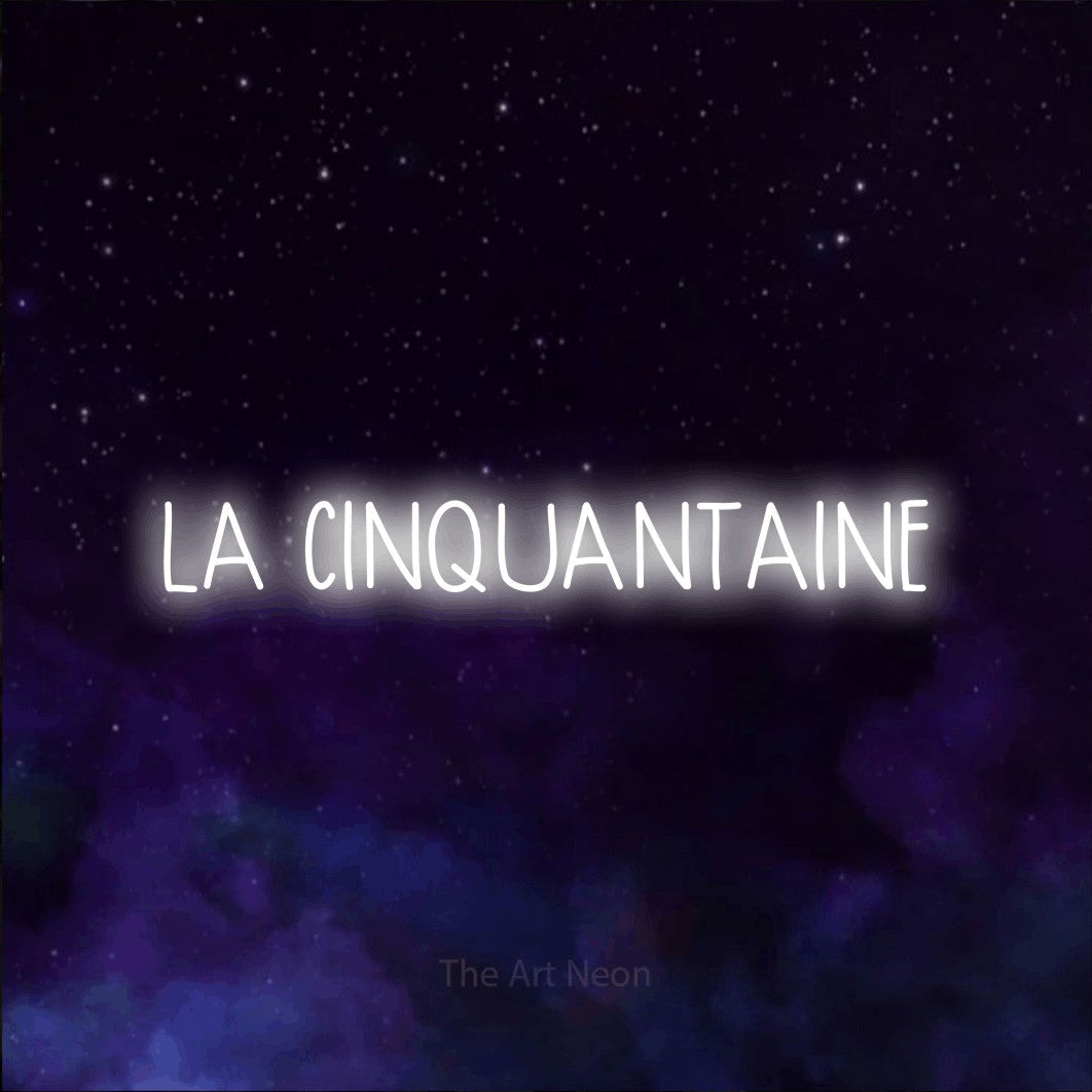 “La cinquantaine” LED neon sign in cool white, with narrow hand-drawn lettering, shown against a purple galaxy backdrop.